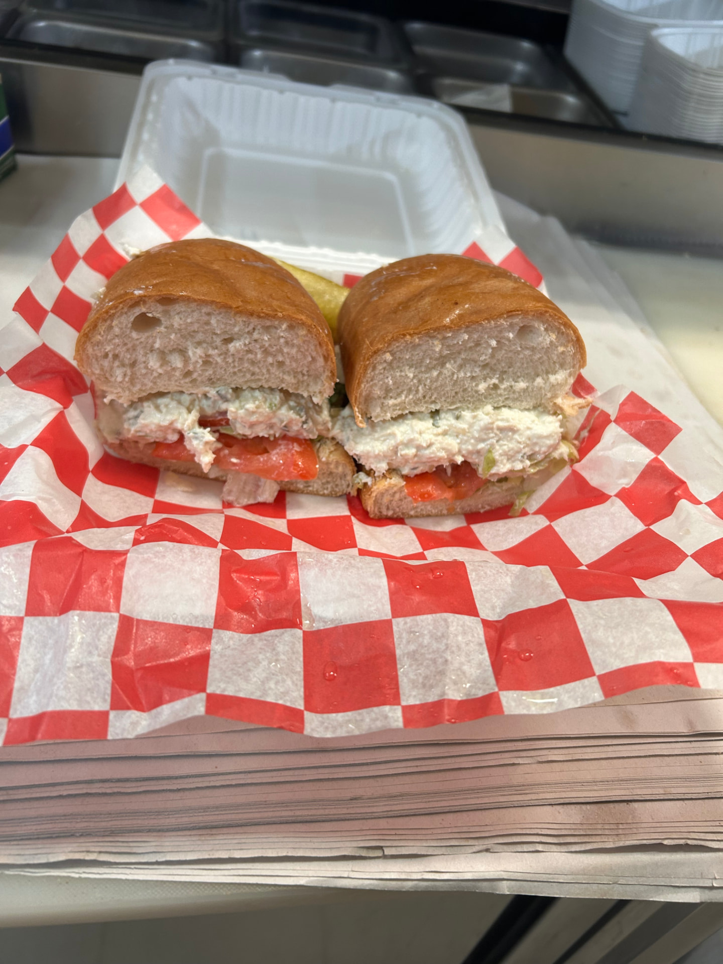 Chicken salad sub with fresh tomato and lettuce