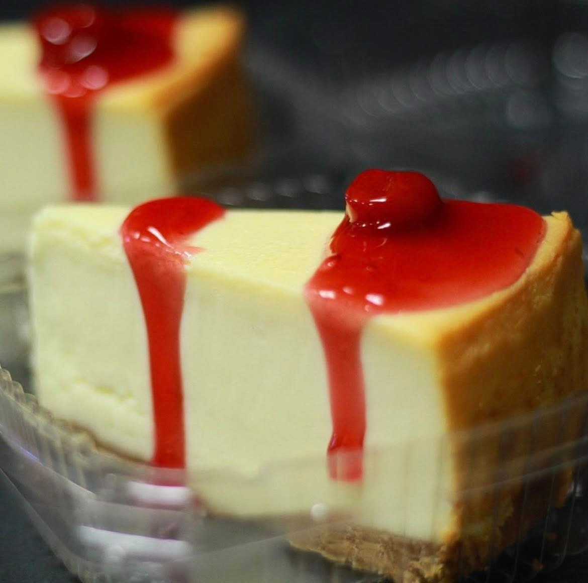Cheesecake slice with strawberry glaze