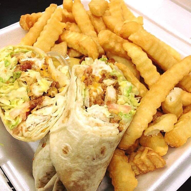 Chicken bacon ranch wrap with crinkle-cut fries