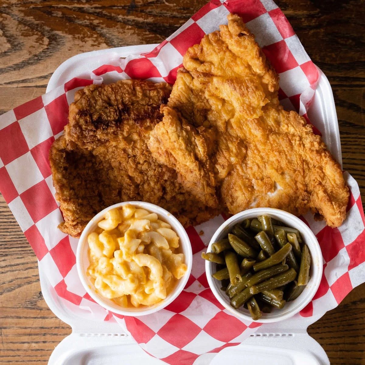 Fried chicken and fish plate with mac and cheese and green beans